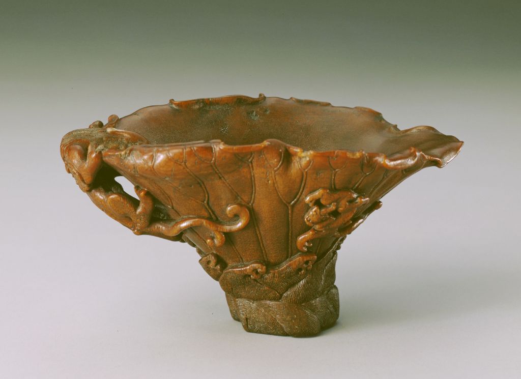 图片[2]-Rhinoceros horn carved double dragon ear dragon pattern lotus leaf cup-China Archive